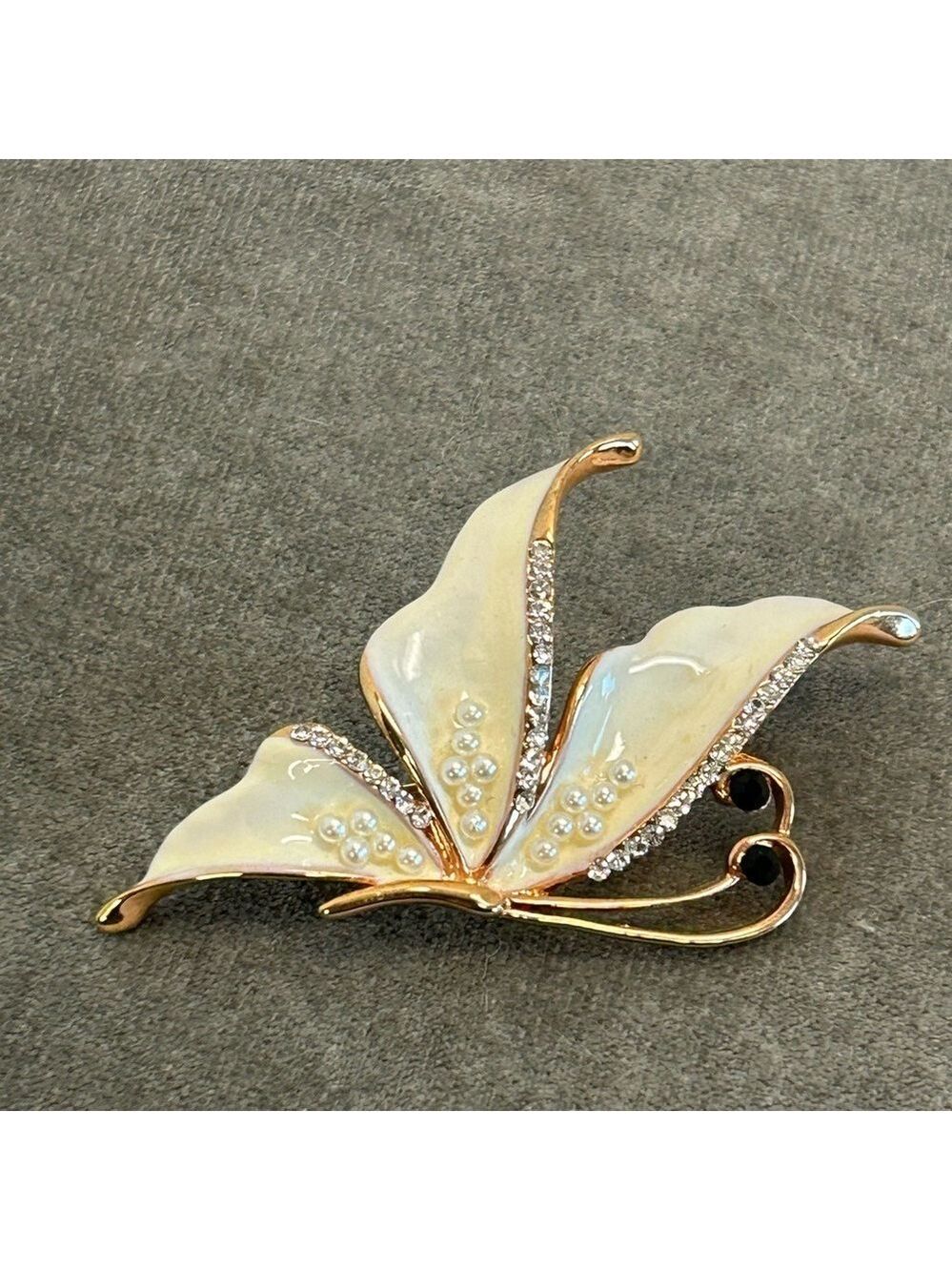 Cream gold tone butterfly brooch pin